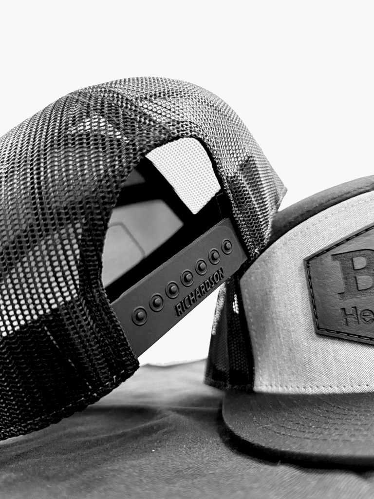 Close-up of adjustable snapback on BMS Mesh Back Trucker Hat, highlighting Richardson branding and rugged jobsite-ready design.
